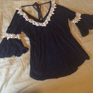 Open back, open shoulder adjustable knit shirt